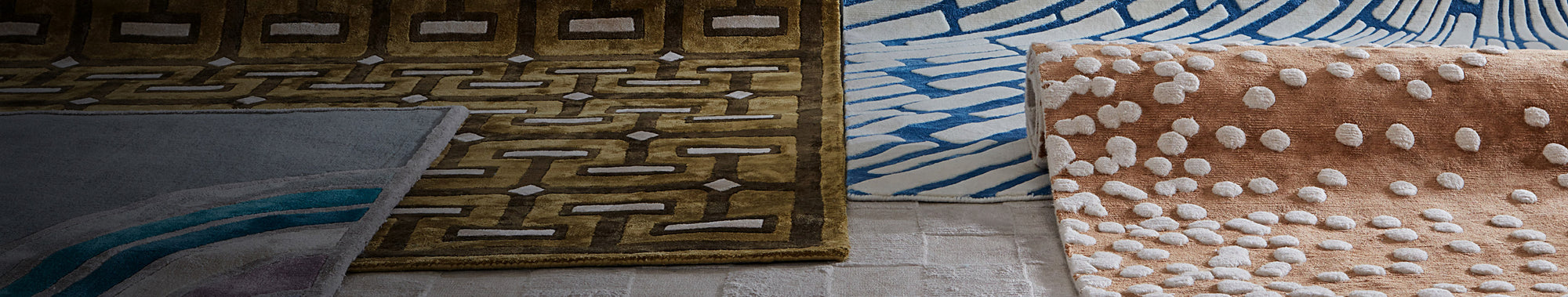 Various rugs displayed on floor