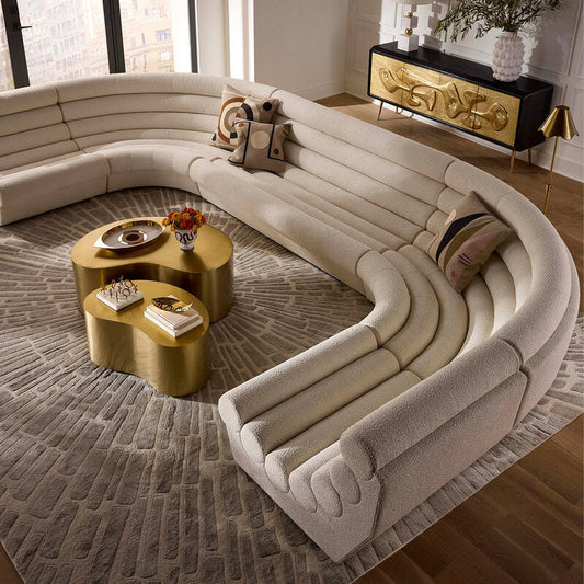White sectional sofa with colorful throw pillows