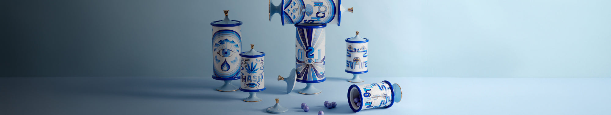 Druggist canisters with blue designs