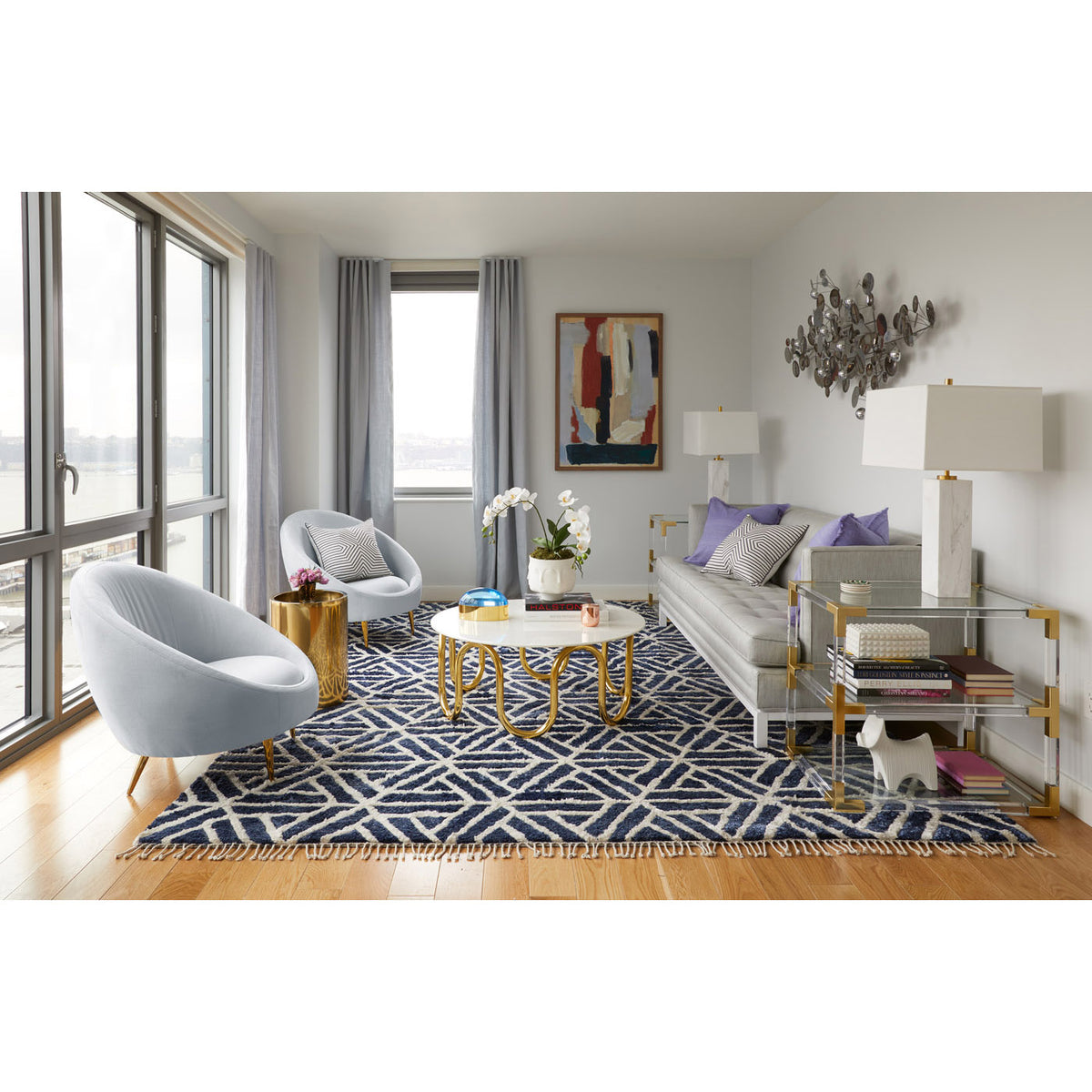 scalinatella cocktail table ether chairs lampert t-arm sofa living room - styled view