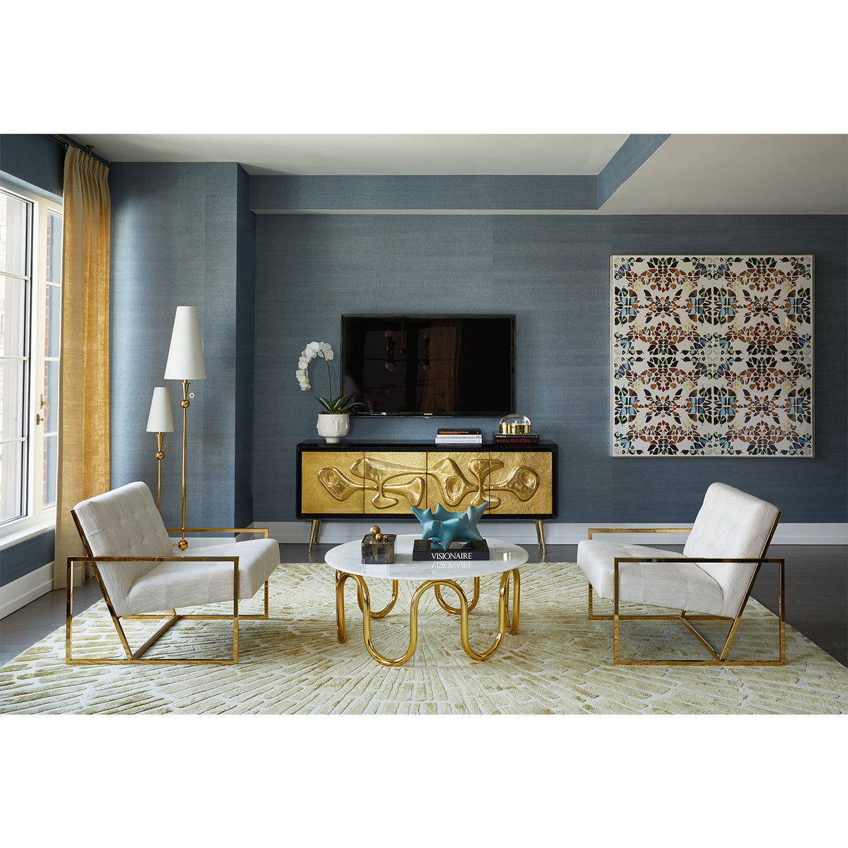 scalinatella cocktail table goldfginer lounge chairs reform credenza living room - styled view