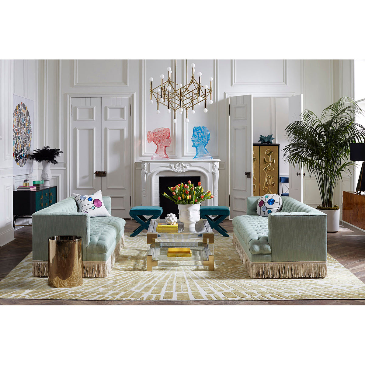 jacques grand cocktail table baxter t-arm sofas with bullion fringe living room - styled view