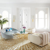 brigitte club chair ether curved sofa scalinatella cocktail table living room - styled view