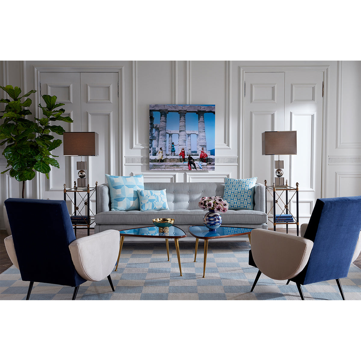 rider two-tier side table baxter chairs fire place living room - styled view