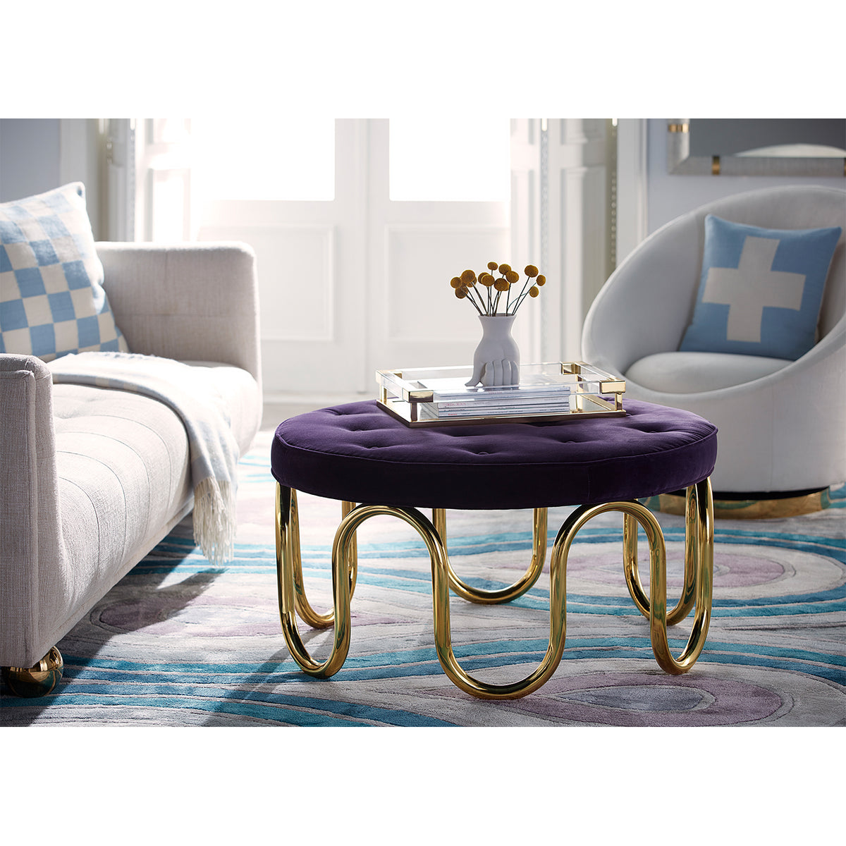 marcel vase with flowers scalinatella ottoman living room - styled view