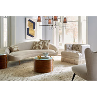 ether curved sofa olympus oatmeal riviera cocktail table baxter t-arm chair with bullion fringe - styled view
