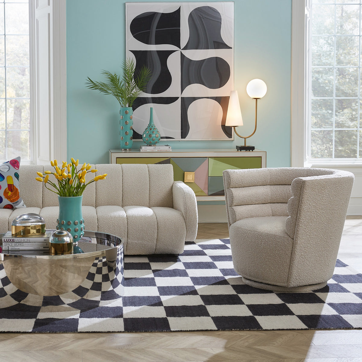 maxime swivel club chair alphaville cocktail table brigitte sofa - styled view