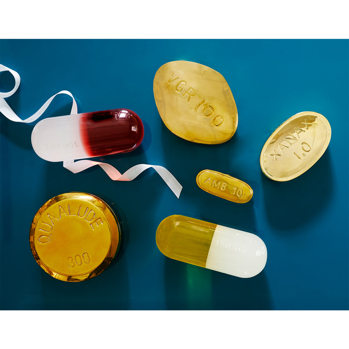 brass pill box collection with ribbon holiday - styled view