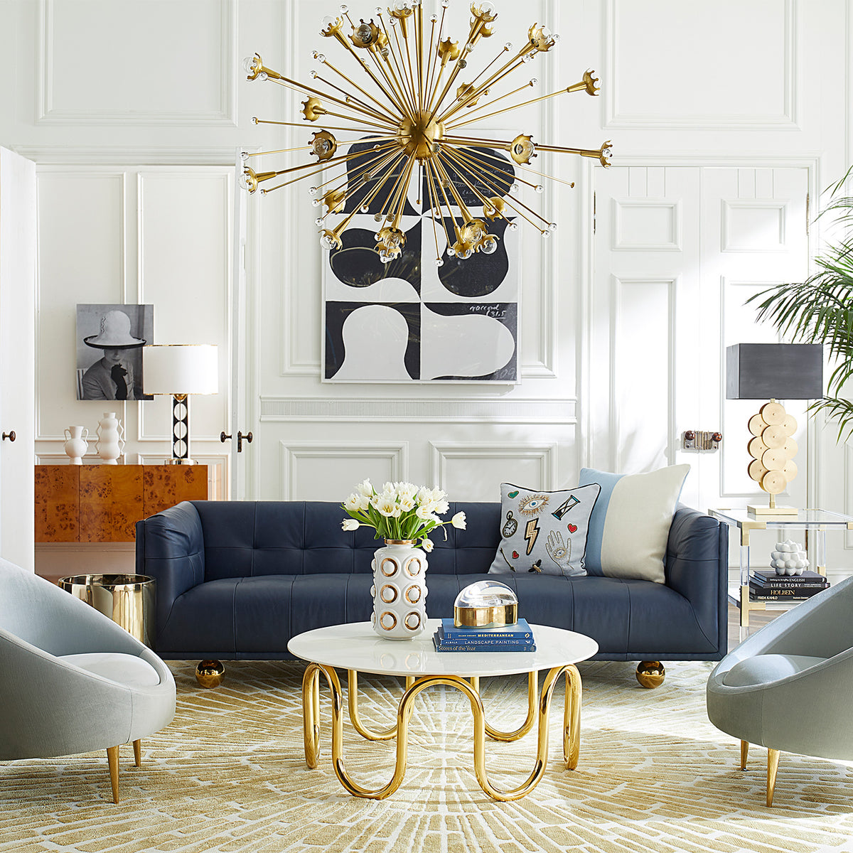 scalinatella cocktail table claridge sofa ether chairs living room - styled view