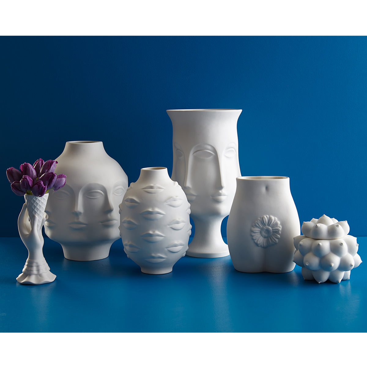 muse pottery collection blue background - styled view
