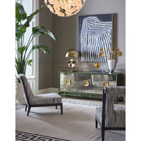 Modern interior with a glass console table, chairs, and abstract art on the wall.