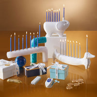 ceramic elephant and dachshund menorahs with candles - styled view 3
