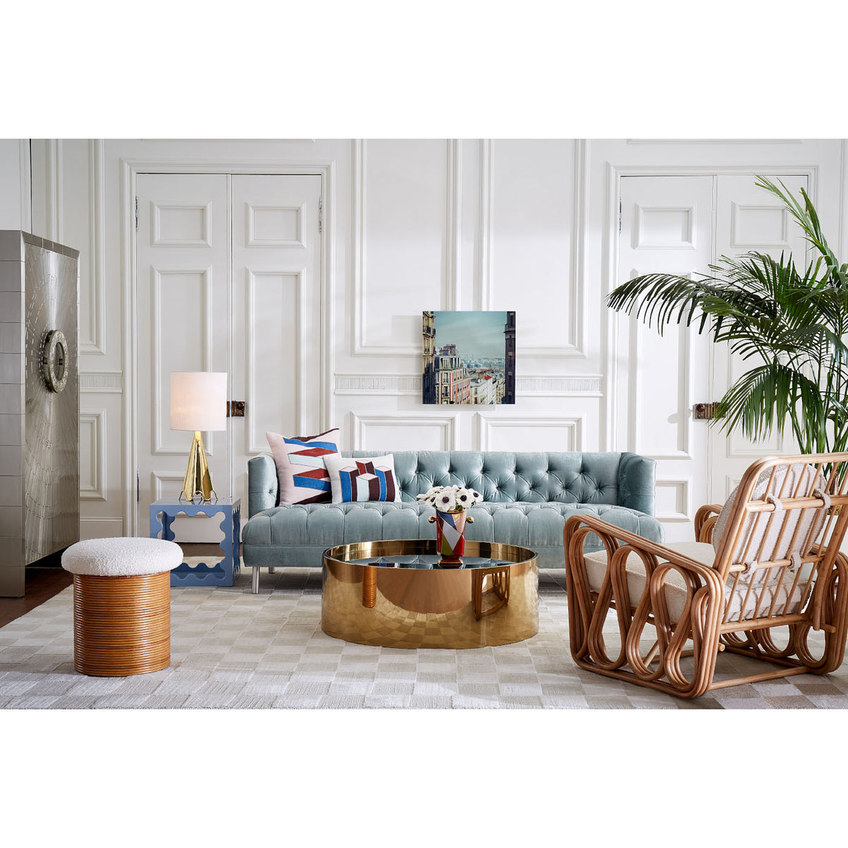 alphaville cocktail table honed brass with riviera lounge chair
