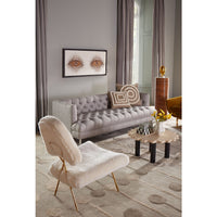 eyes beaded wall art baxter t-arm sofa ripple circle travertine cocktail table - styled view