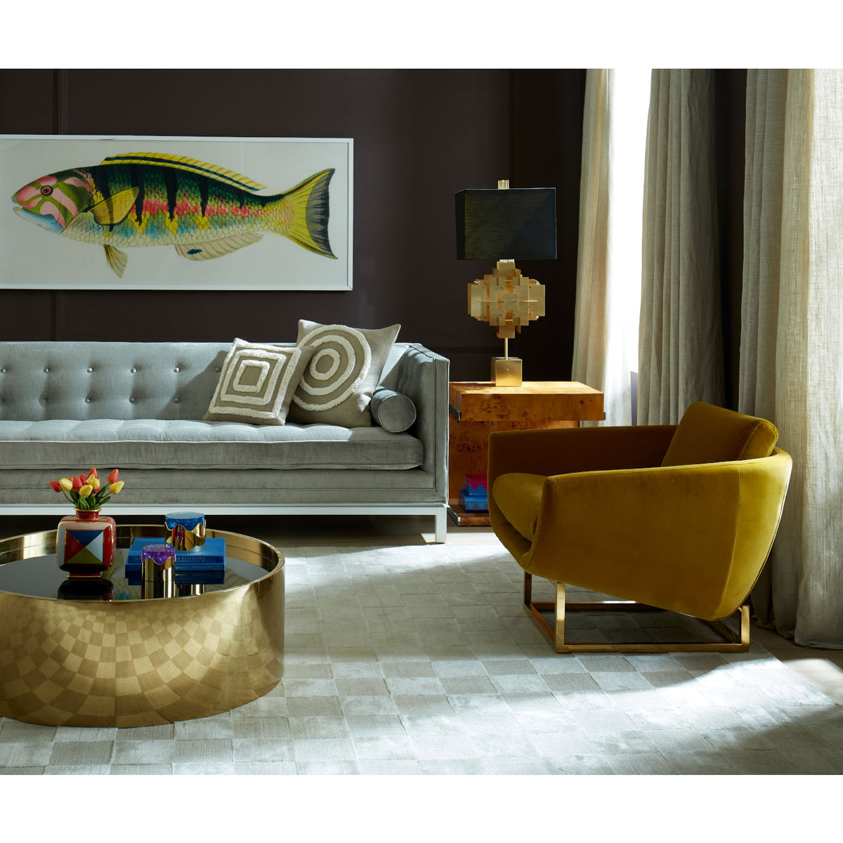 alphaville cocktail table honed brass with beaumont chair