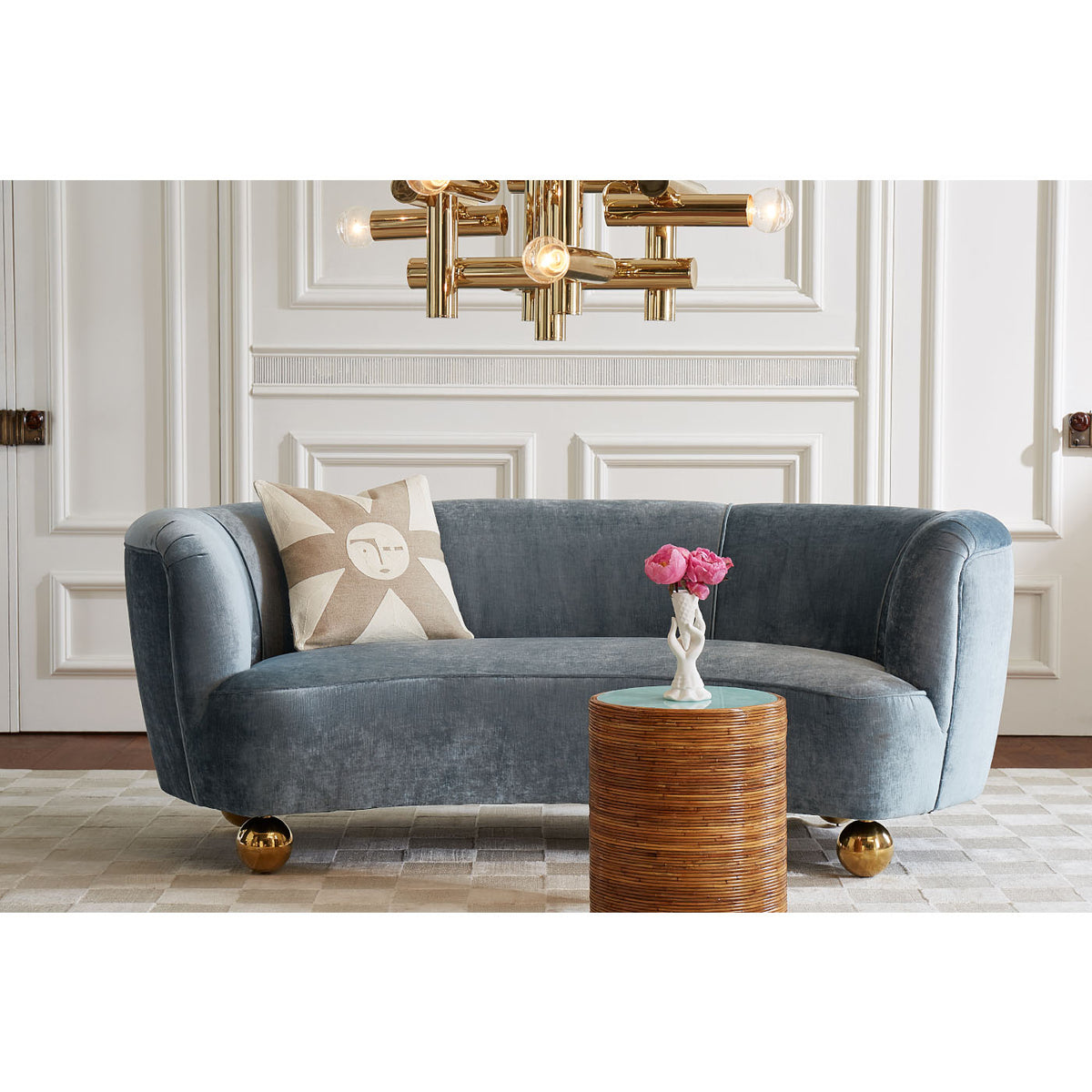 Living Room with Parker Curved in blue velvet and Ripple Cocktail Table