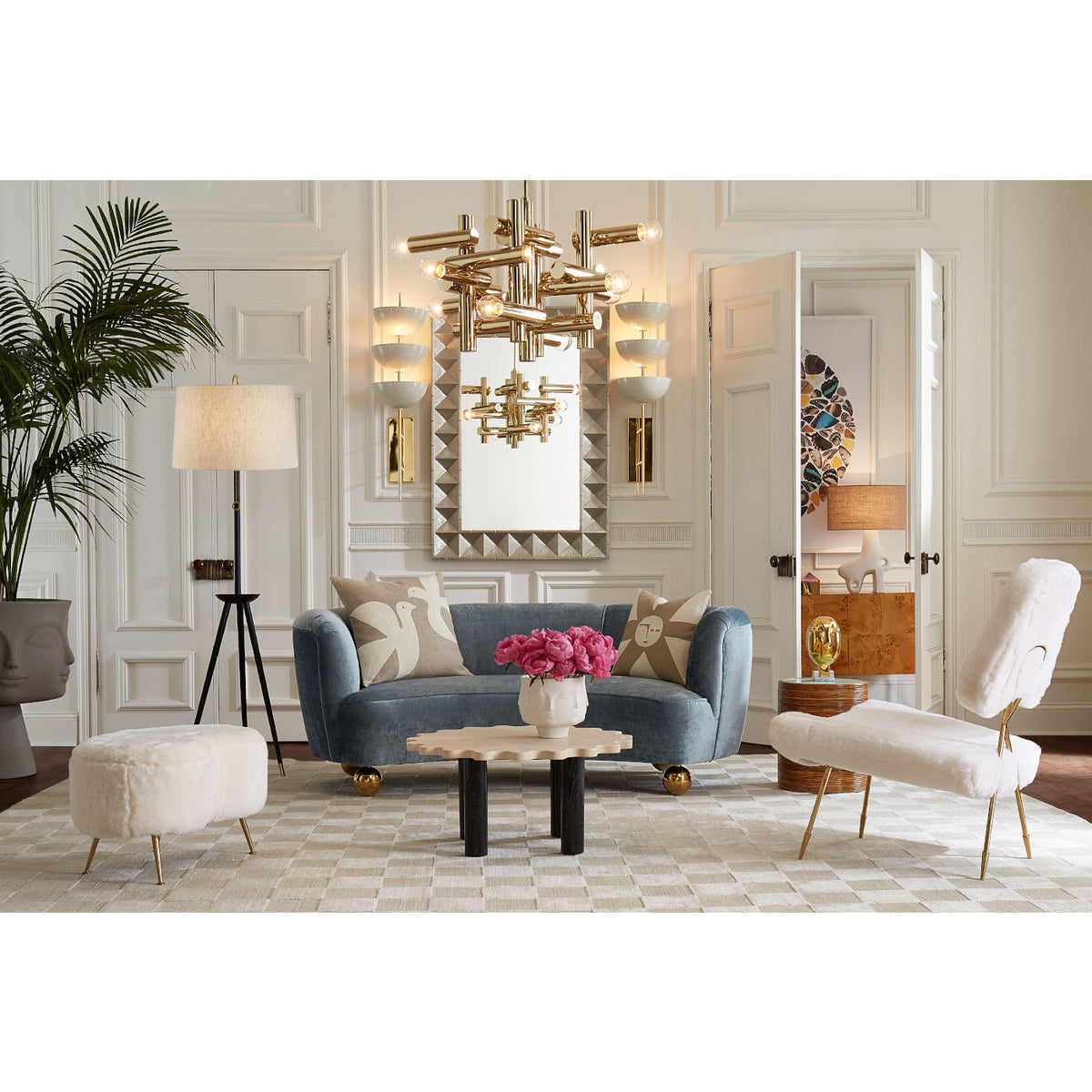 Living Room with Parker Curved in blue velvet at angle with Sunburst Rug