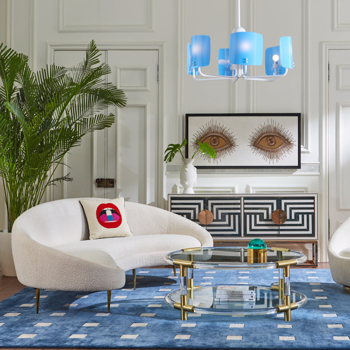 ether curved sofa jacques round cocktail table small squares hand knotted rug - styled view