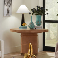 brussels dining table prisma table lamp maritime vases - styled view