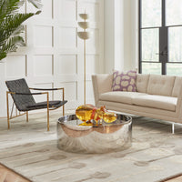 giant acrylic hippo alphaville cocktail table thebes lounge chair - styled view