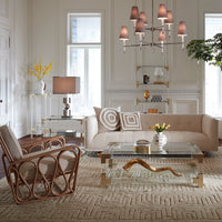 giant brass horn jacques grand cocktail table claridge sofa - styled view