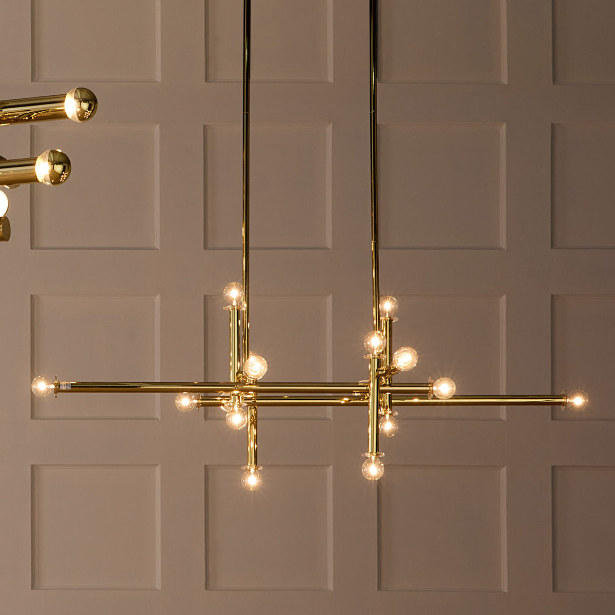 milano linear chandelier brass styled view