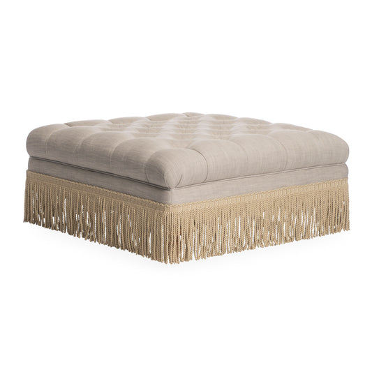 baxter ottoman with bullion fringe dublin oatmeal linen turned wood legs - angle view