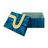 Blue decorative box with a yellow handle on a white background