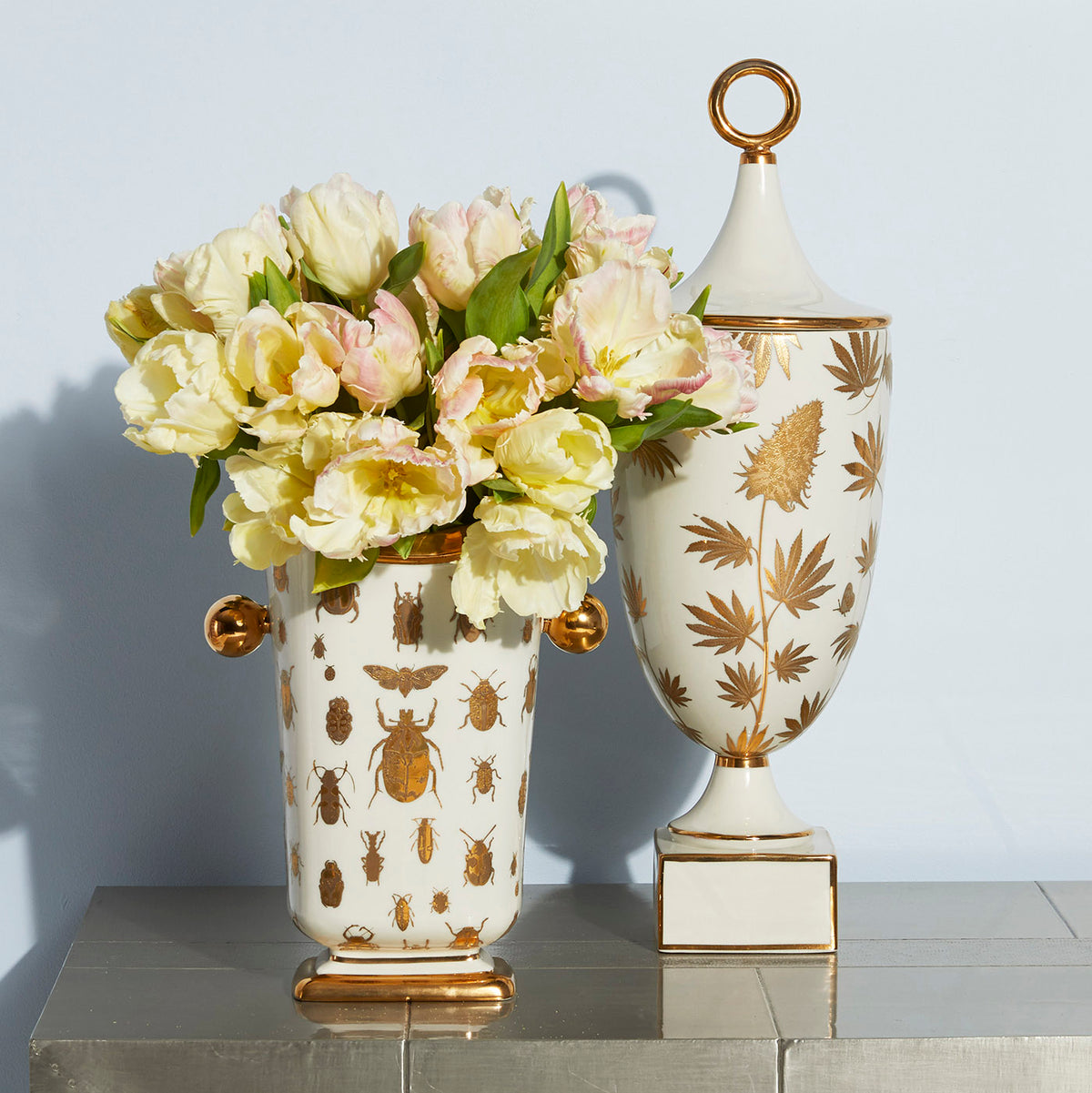botanist pottery collection with flowers - styled view
