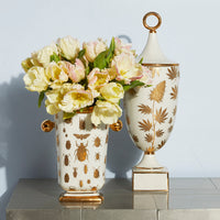 botanist pottery collection with flowers - styled view