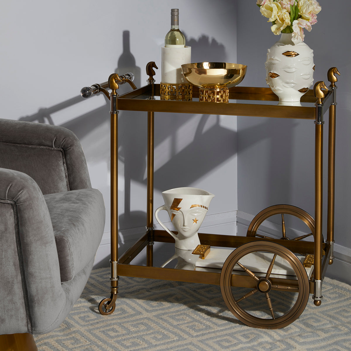 gilded giuliette pitcher cheval bar cart - styled view
