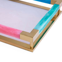Gold-framed artwork with colorful abstract design on a white background