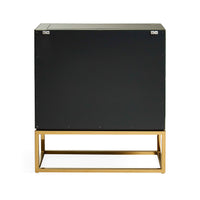 Black cabinet with gold base on a white background