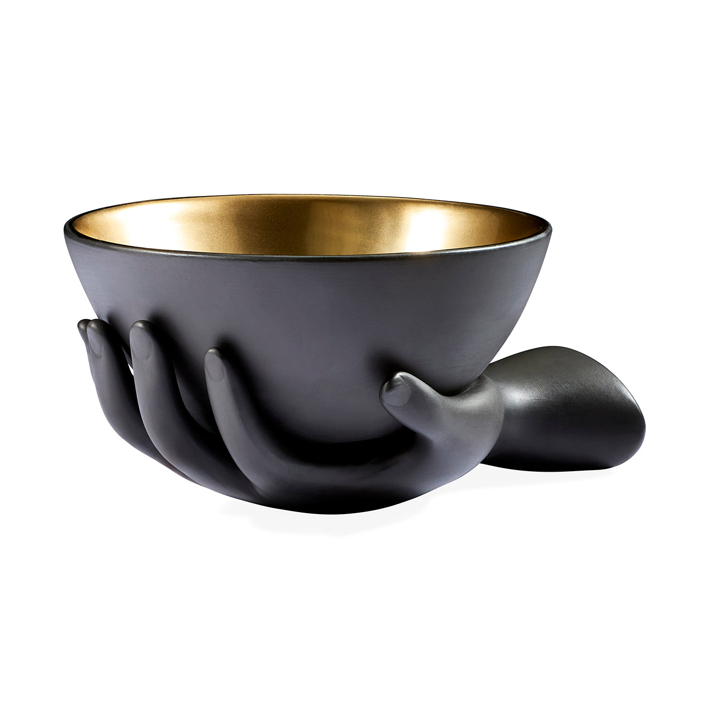 A matte black sculptural bowl with a metallic gold interior, supported by three stylized hand shapes on the front and a small side tab, shown on a plain white background.