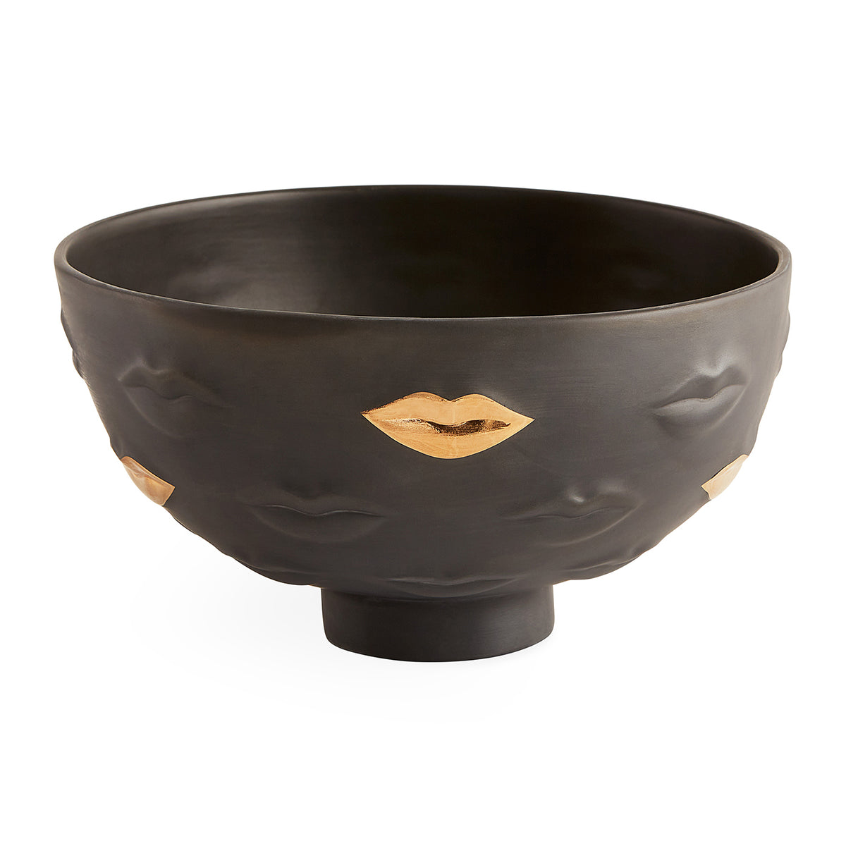 Black bowl with gold lips design on a white background