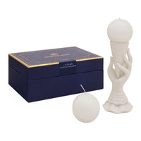 Candle holder and candles with a branded box on a white background
