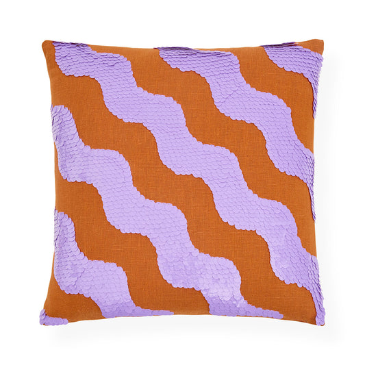 Decorative pillow with wavy purple pattern on orange background