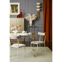 dora maar urn with white ostrich feathers jacques dining table rider dining chairs - styled view
