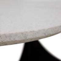 Close-up of a concrete table top with a white background