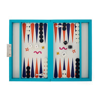 Backgammon set with colorful pieces and a blue frame on a white background