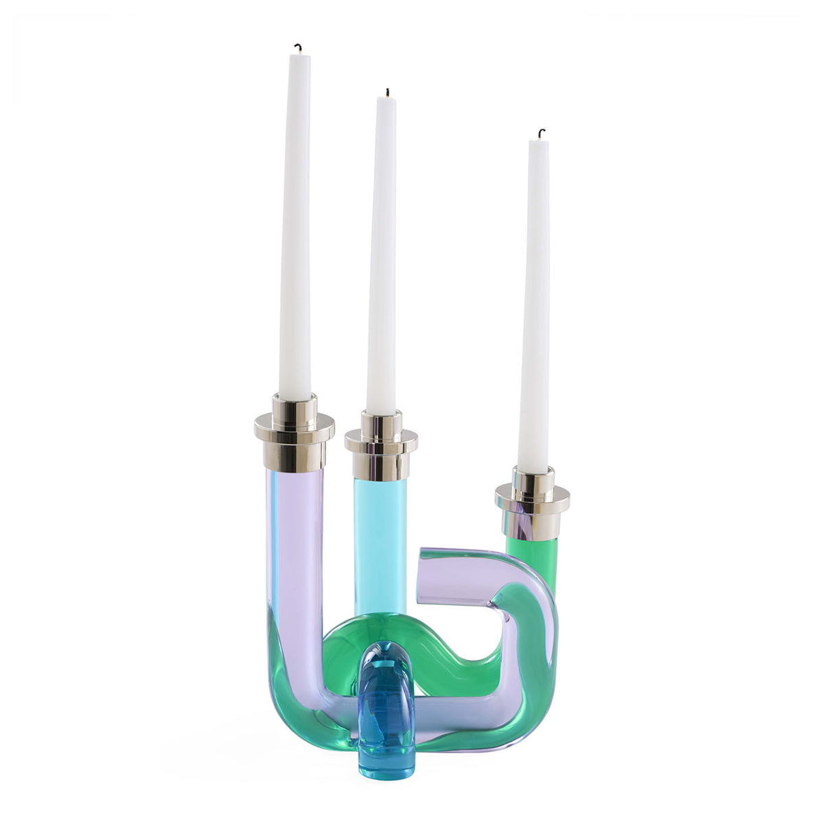 Colorful glass candle holder with three white candles on a white background