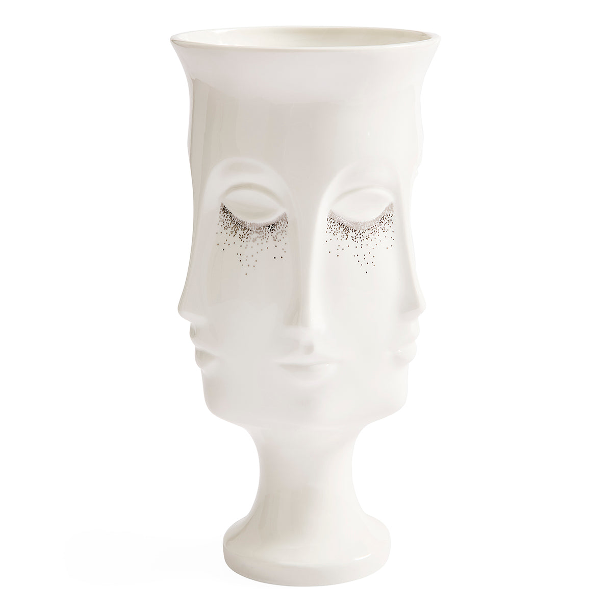 A white ceramic vase shaped like a stylized human face with closed eyes and small black speckled details under the eyes, shown on a plain white background.