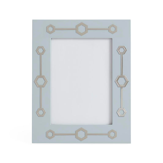 Decorative picture frame with geometric patterns on a white background